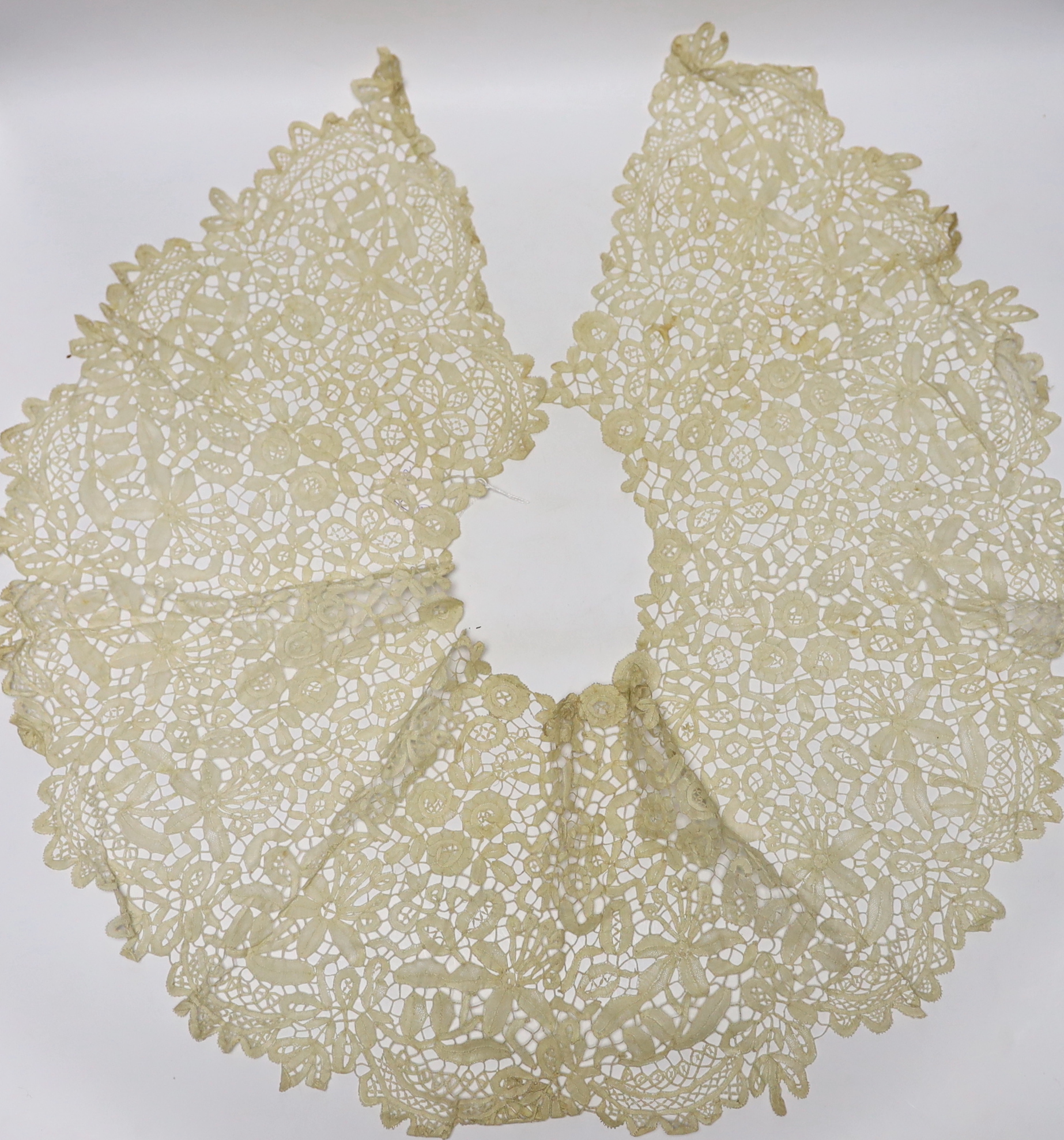 A long 19th century mixed Brussels lace collar, with 20 needle lace oval insertions, a similar wider Honiton bobbin lace collar and a machine lace bonnet veil